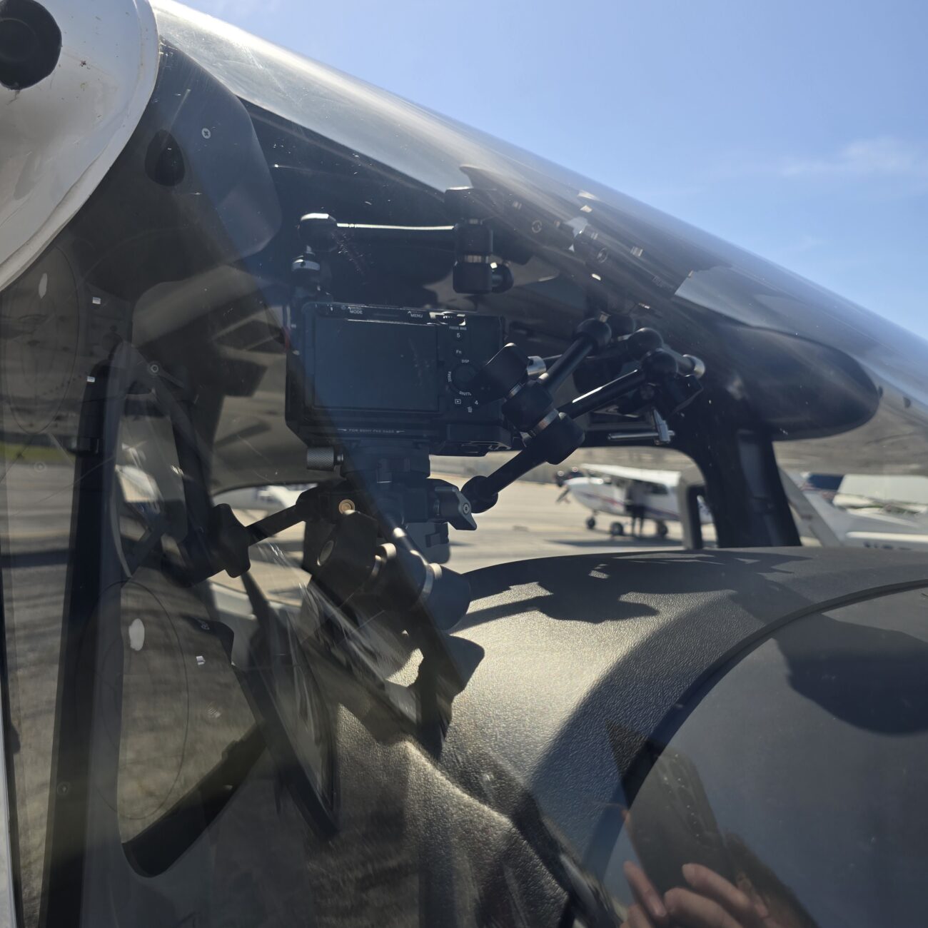 Professional interior aviation camera setup for cinematic flight video production.