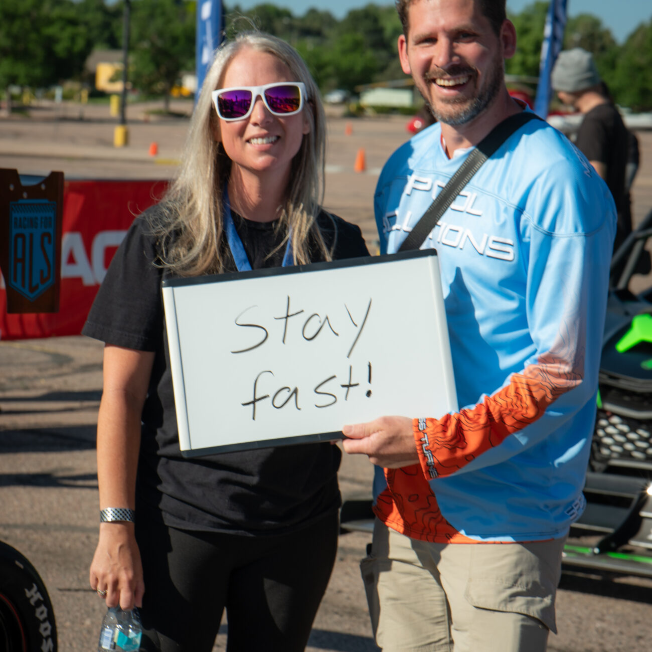 Pikes Peak driver Ryan Cheek joins the “Stay Fast” whiteboard tradition.