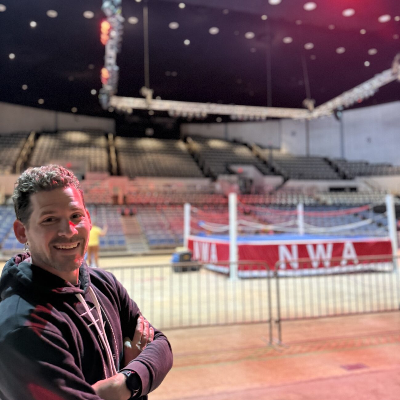 Camera operator Philip A. Young inside the National Wrestling Alliance arena setup in Dothan, Alabama.
