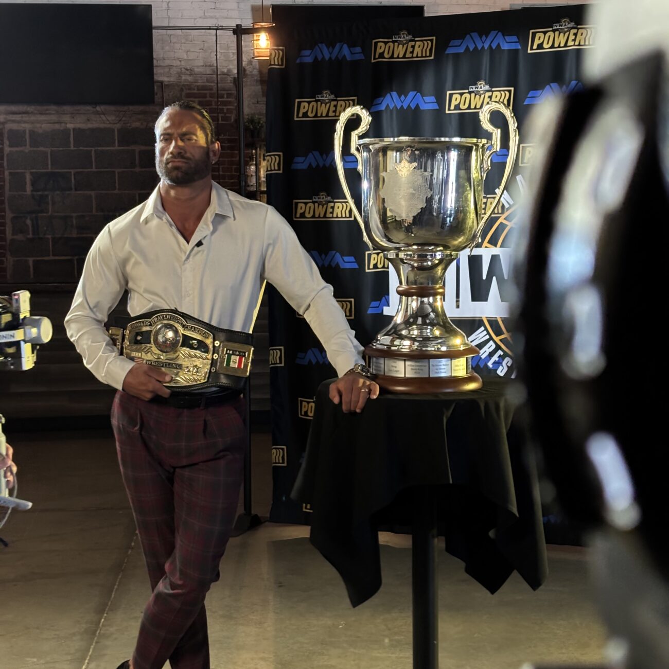 Thomas Latimer NWA wrestling world champion with trophy filmed by Philip Young Knoxville DP