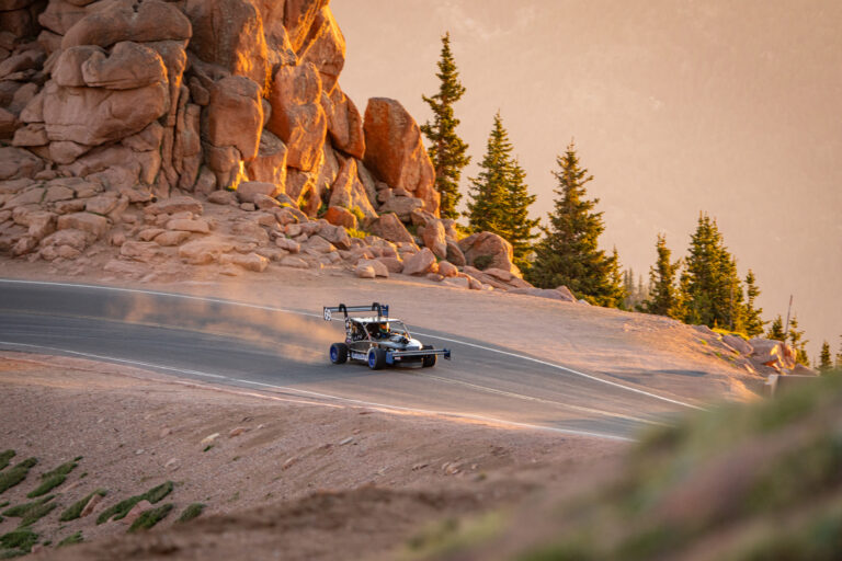 Yuri’s race car climbing a mountain section during the Pikes Peak International Hill Climb.