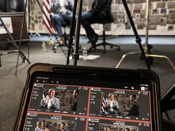 Camera and production monitor showing multiple angles of General Mike Flynn during an interview.